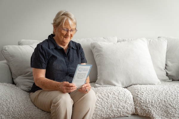 older lady reading a book
