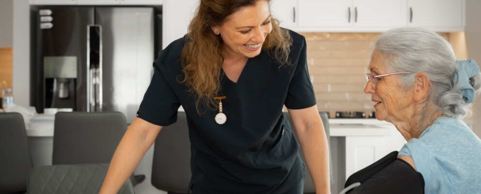 Nurse helping patient with care at residential facility under consumer rights under the new aged care act